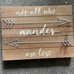 “Not all who wander are lost” wood sign